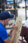 Jonathan Baker of Jonathan B SLC works on a new piece waiting for more customers. Photo: Chris Gariety