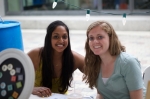 Rani Bean and Melissa Moyle enjoy a nice afternoon while showcasing Moyle's crafts. Photo: Chris Gariety