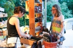 “Liz has too many purses,” Erica said as Liz flipped through purses at 58 Bluebirds. Photo: John Barkiple