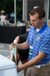 Local brewer representives pouring fresh frothy selections for VIPs on the VIP Patio. Photo: @LmSorenson