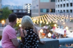 Couples flock to the balcony railing to see the view of the fading light over the Craft Lake City DIY Festival. Photo: @LmSorenson