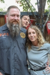 Squatters' brewmaster Jason Stock (L) enjoys a beer with SLUG writer Ashley Mason (R), and that’s Tony Coppola with an irresistible photobomb. Photo: John Barkiple.