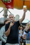 Squatters cofounder Jeff Polychronis raises a glass to 25 years of successful brewpub-ery in Salt Lake and beyond. With attention to detail, he insisted that guests top off their glasses before he said a few words. Photo: John Barkiple.
