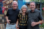 John McCarthy, Letty Flatt and Peter Floodman chat near the bar. For more than 15 years, Flatt has hosted a living-room yoga group that includes Peter Cole and two other friends. Photo: John Barkiple.