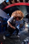 Reba Meyers of Code Orange was a ball of energy, getting low and thrashing her long red hair without hesitation. Photo: Matthew Windsor