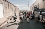 Skaters and crowd gather around at the first bonus round stop. Photo: Martin S Rivero