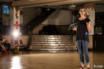 Ashley Anderson introduces MUDSON: loveDANCEmore, a modern dance performance. She also thanked her sponsors and invited the audience to share their opinions with the dancers after their performances. Photo by John Barkiple.