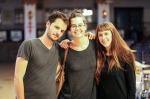 Samuel Hanson, Ashley Anderson, and Amy Falls pause before MUDSON: loveDANCEmore begins. Hanson and Falls take care of final audio and lighting adjustments before the modern dance performances begin. Photo by John Barkiple.