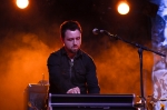 Synth and bass player for Rachael Yamagata, looking mysterious with the fog background. Photo: LmSorenson.net