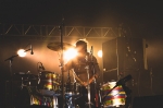 Silhouette of drummer Patrick Carney, hammering every beat like it was nothing. Photo: Logan Sorenson