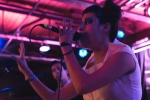 Zahira Gutierrez singing animatedly to the crowd onstage at Urban Lounge. Photo: @LMSorenson