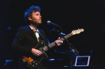 Gabriel Kahane playing guitar in his unique quirky folk style of music. Photo: @Lmsorenson