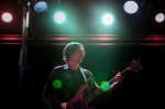 Bassist  Daniel Colussi of The Shilohs jamming under stage lights. Photo: @Lmsorenson