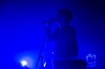 Band front man Mark Foster takes the stage with his band members in a slow to build intro in a moody light. Photo: @Lmsorenson / Lmsorenson.net