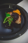 Bistro 222 brought out the big guns with their pork tenderloin wrapped in bacon, garnished with three berry gastrique and sweet potato puree. Photo: Talyn Sherer