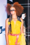 A model poses as part of one of the many fashion installations. Photo: Tyson Call