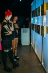 Models taking a chance to check out the art on display. Photo: Tyson Call