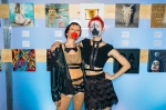 (L–R): Julianne Smith and Katrina Swaringen show their "Vicious" looks while checking out the art. Photo: Tyson Call