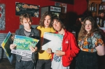 New owners of the Death by Salt V album in limited edition vinyl hold up their purchase. Photo: Tyson Call
