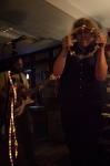 Vocalist Rocky Maldonado of The Nods rockin' the tambourine. Photo by www.jessicabundyphotography.com