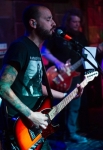 Williams strums and yells at CrucialFest 5. Photo by Madi Smith