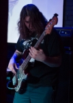Demon Lung bassist Jason Lamb performs for a crowd of fans. Photo by Madi Smith