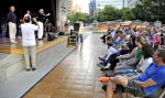 Steve Williams introduces the Corey Christiansen Trio to the Gallivan Center crowd. The free concert was part of the celebration of Steve's career. Photo by Scott Frederick
