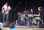 (L–R): Corey Christiansen, Jay Lawrence, and Ryan Conger perform for the Gallivan Center crowd. Photo by Scott Frederick