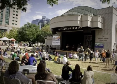 Crowd lounges outside at the Gallivan Center at the First Annual Craft Lake City event.