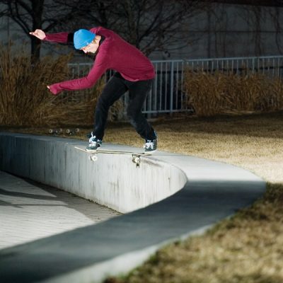 Odeus flow rider Kendall Johnson demonstrates a perfectly executed backside tail slide on a library square.