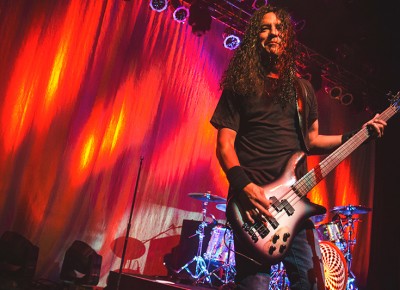 Bassist Mike Inez smiles to a fan in the crowd who proudly represented Alice in Chains swag from the earlier years. Photo: Talyn Sherer