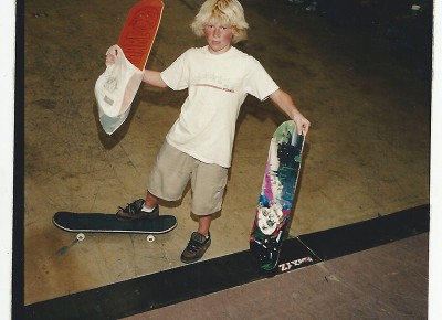 A young Oliver Buchanan shows off his new boards.