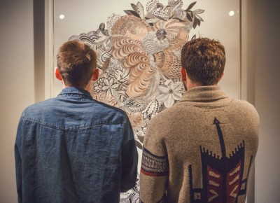 Two lost souls engulf themselves in the intricate maze of beauty created by artist Firelei Báez. Photo: Talyn Sherer