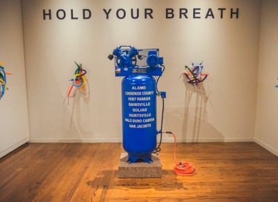 Artist Mel Ziegler showcases his “Hold Your Breath” display, which reminds me of a very disappointing birthday party with a clown who can’t make a simple balloon animal. Photo: Talyn Sherer