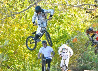 Seth Huot leads a tight train of costumed friends. Photo by Andy Fitzgerrell