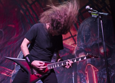 Lum furiously bangs his head during Exodus' set. Photo by Madi Smith.