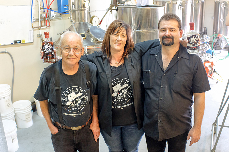 (L–R) Bob, Denise and Kirk Sedgwick of Outlaw Distillery tout a renegade spirit contrary to overbearing Utah liquor laws.