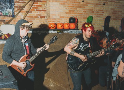 (L–R) Skyler Bush playing his Gibson SG along Chaz Costello. Photo: Tyson Call @clancycoop