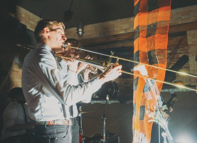 Peter Barret plays the trombone as part of Amy Winehouse (Show Me Island). Photo: Tyson Call @clancycoop