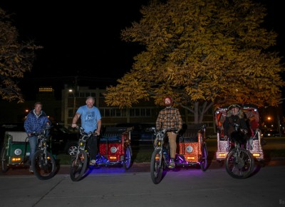 Salt City Cycle Cab drivers line up to haul Garth Brooks fans after his Halloween show at the Vivint Smart Home Arena. Photo: John Barkiple