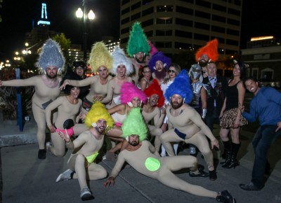 A group of troll dolls marched from Club Elevate to the Super Top Secret party on Edison Street. Photo: John Barkiple