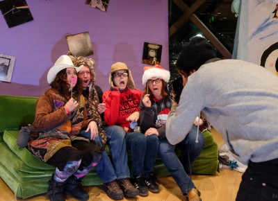 (L-R) Heidi McDaniel, Janson Cross, Secily Tinyhand and Hillary Mauermann pose for Photo Collective’s Dave Brewer at the photo booth for KRCL’s 2015 Polar Jubilee. Tinyhand and Mauermann love the Women Who Rock radio show – they even have the lunchboxes to prove it. Photo: John Barkiple