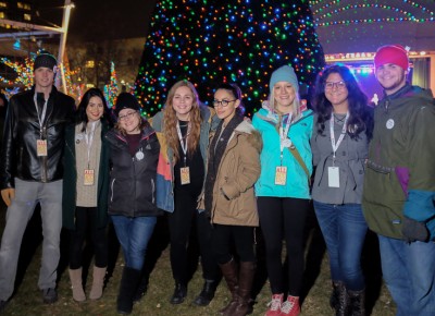 (L-R) Ben Beacom, Mary Nejatifar, DJ Shanalee Otanez, Kali Sutherland, Elida Vargas, Phoenix Poore, Jade Matkin and Chandler Tippins from KRCL’s Loud and Clear youth radio program volunteered to help set up the Gallivan Center. Otanez is proud of their fine writing as they prepare their second round of radio shows. Photo: John Barkiple