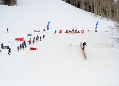 The first riders head up the hill for practice runs before the 17 & Under contests get under way. Photo: Niels Jensen