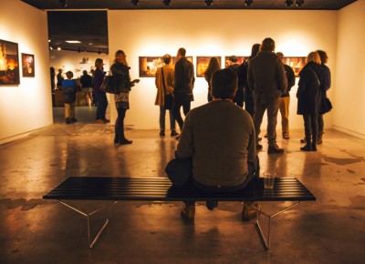 Inside the David Brothers exhibit, an art aficionado takes a seat to soak up the pure talent surrounding him. Photo: talynsherer.com