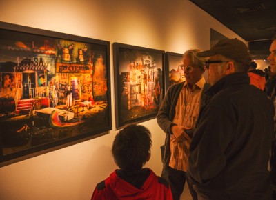 David Brothers (cardigan) describes his process to patrons of all ages. Photo: talynsherer.com