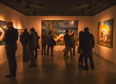 UMOCA's entrance display showcases artist Andrew Moncrief's "A Strange Feeling" paintings which recall Olympian wrestling statues from ancient Greece. Photo: talynsherer.com