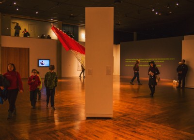 A divisive wall on UMOCA's lower level gives the museum occupants an obstacle to take laps around as they explore the artwork donning the walls and floors. Photo: talynsherer.com