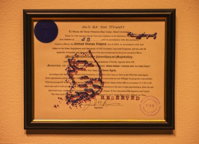 A U.S. foreign policy document with the title "Hold For Jon Stewart" is perfectly framed among its brethren created by artist Dan Mills. Photo: talynsherer.com