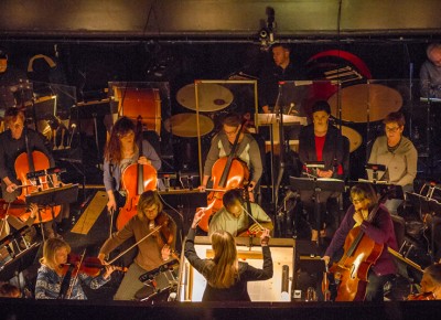 The composer prepares the symphony for the dance. Photo: Talyn Sherer